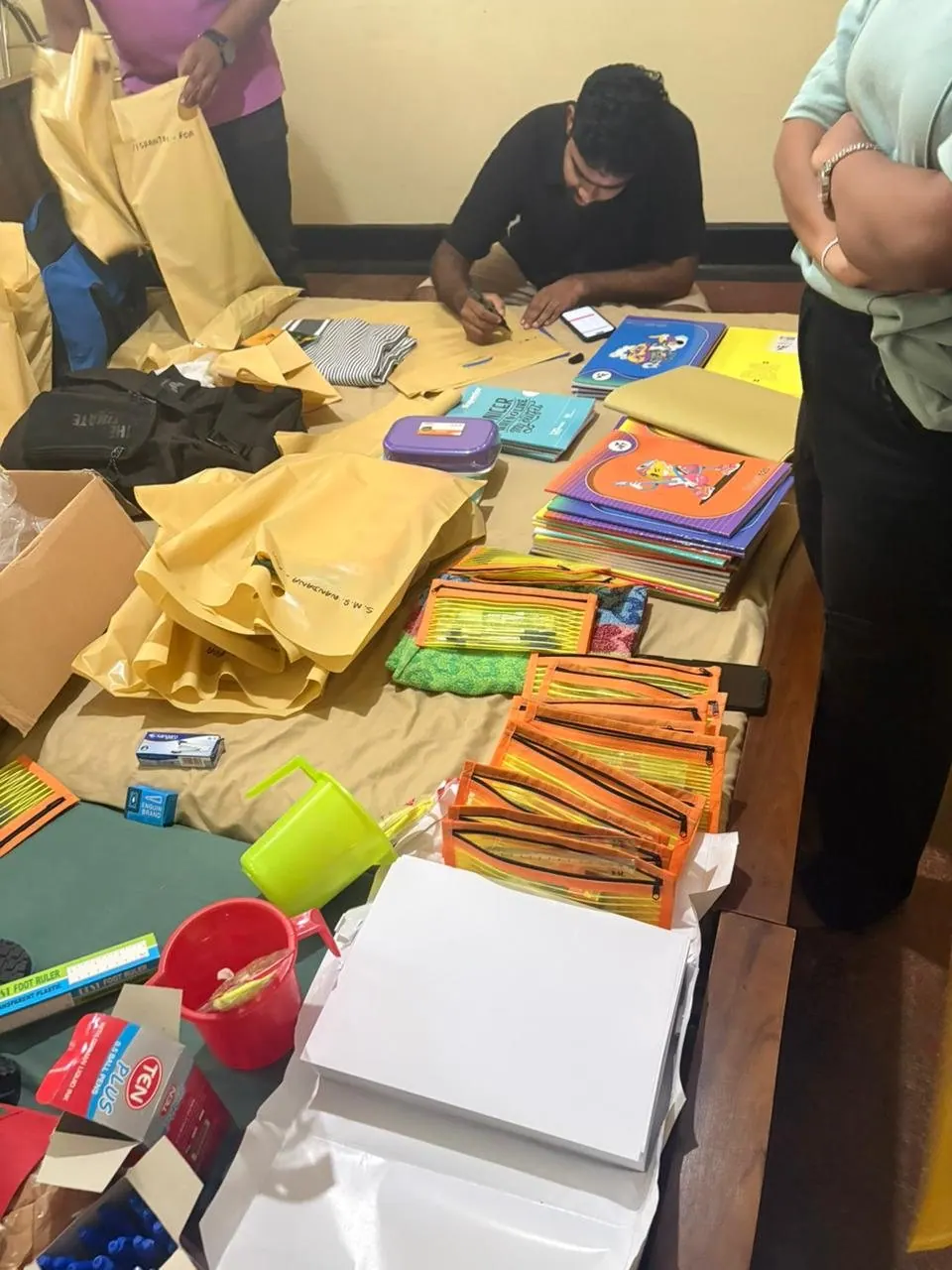 Project Parithyaga: relief packages for students hit by the floods